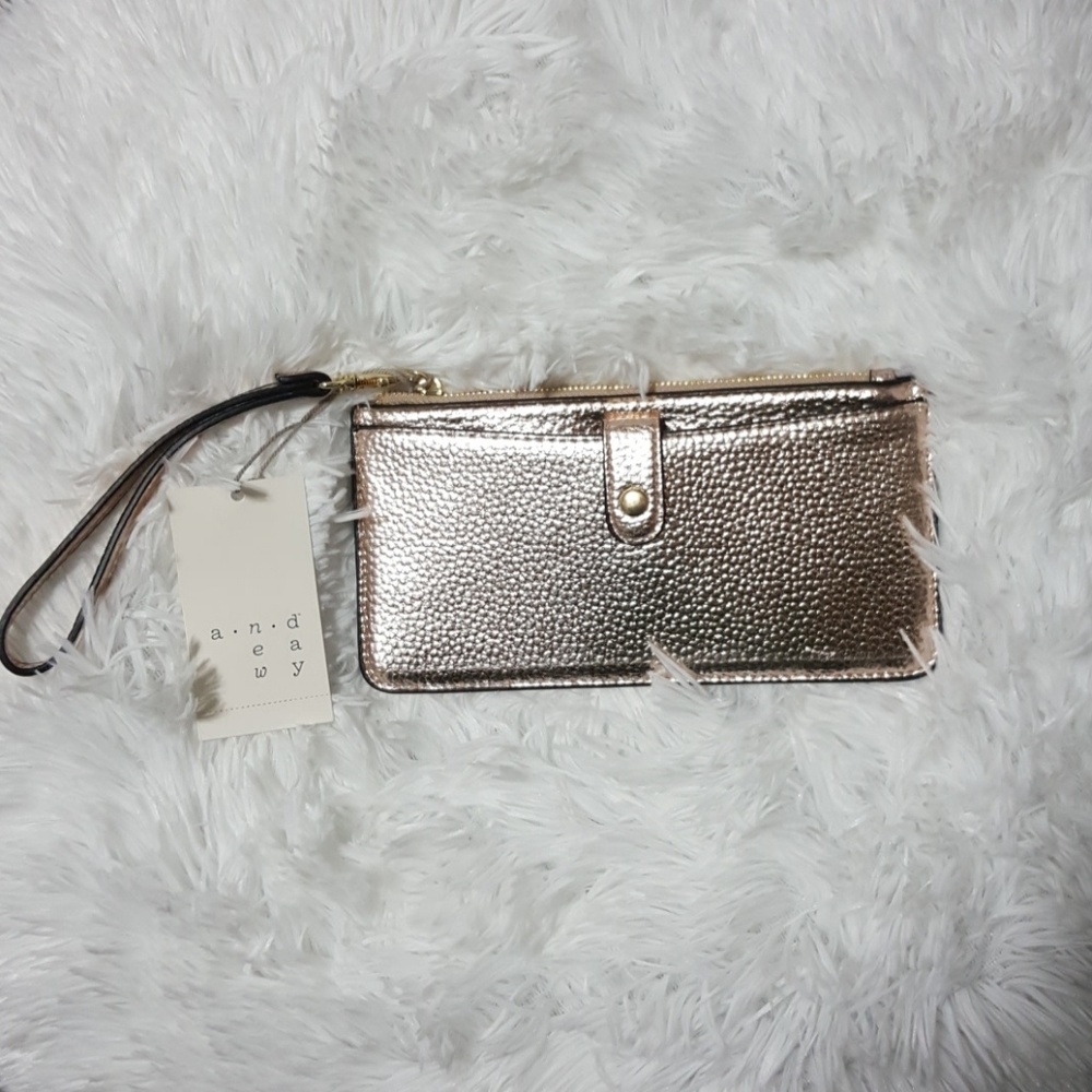 A new day rose gold wristlet wallet
